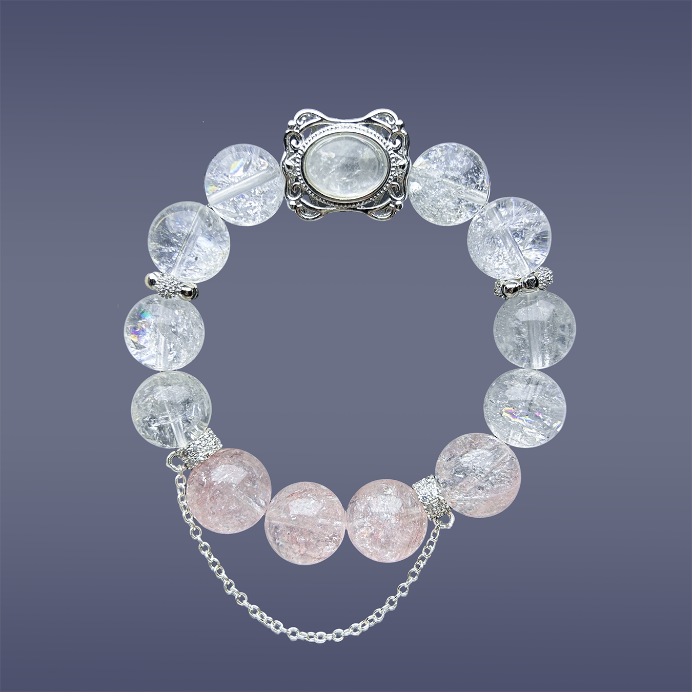 Hang lay of Blossom Valley bracelet with rutilated quartz centerpiece and azeztulite beads.