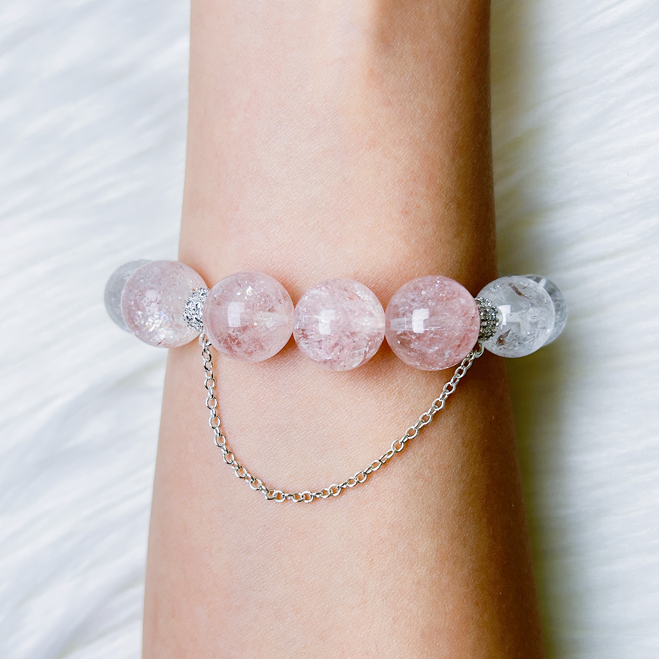 Back view of Blossom Valley bracelet highlighting the soft pink azeztulite worn on wrist