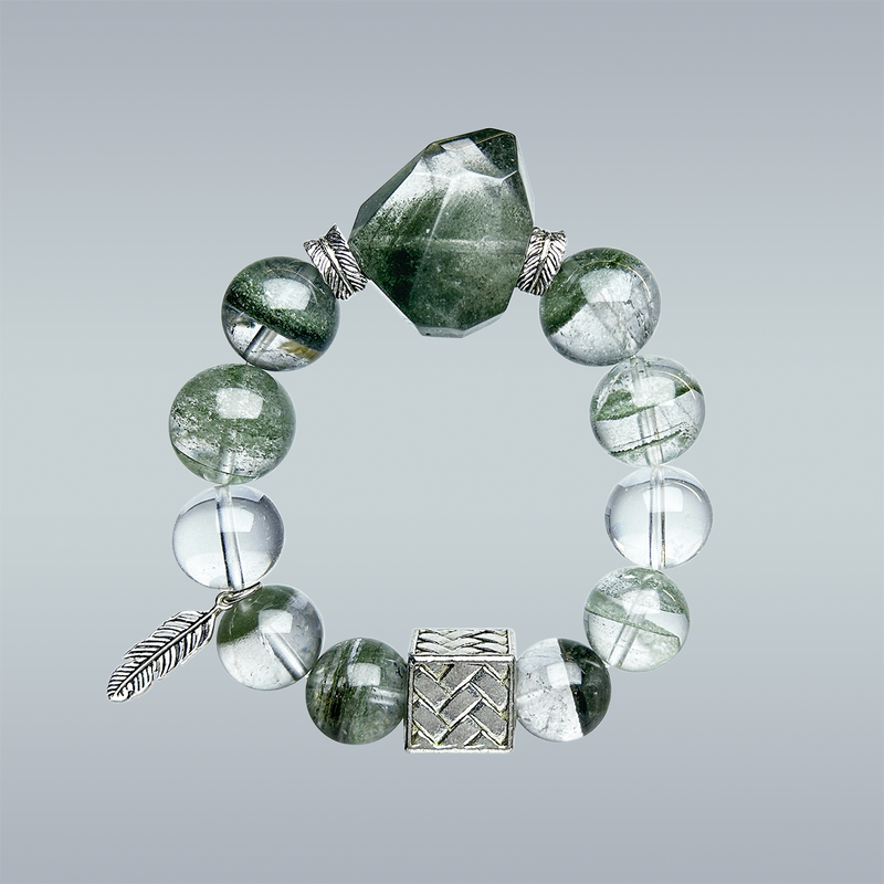 Product photo of handmade Green Phantom and Clear Quartz bracelet with silver feather charm