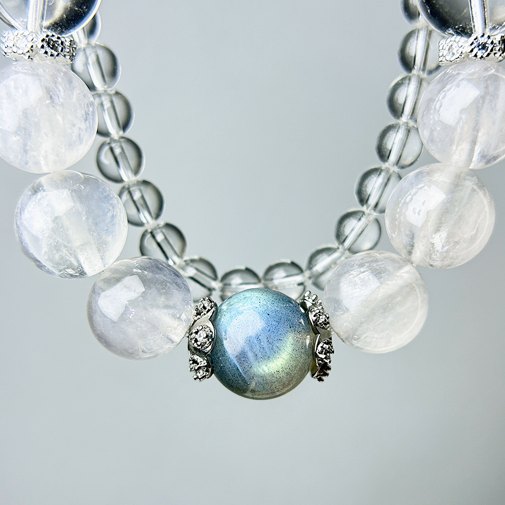Close-up of iridescent labradorite centerpiece with Rutilated Quartz and clear Quartz 