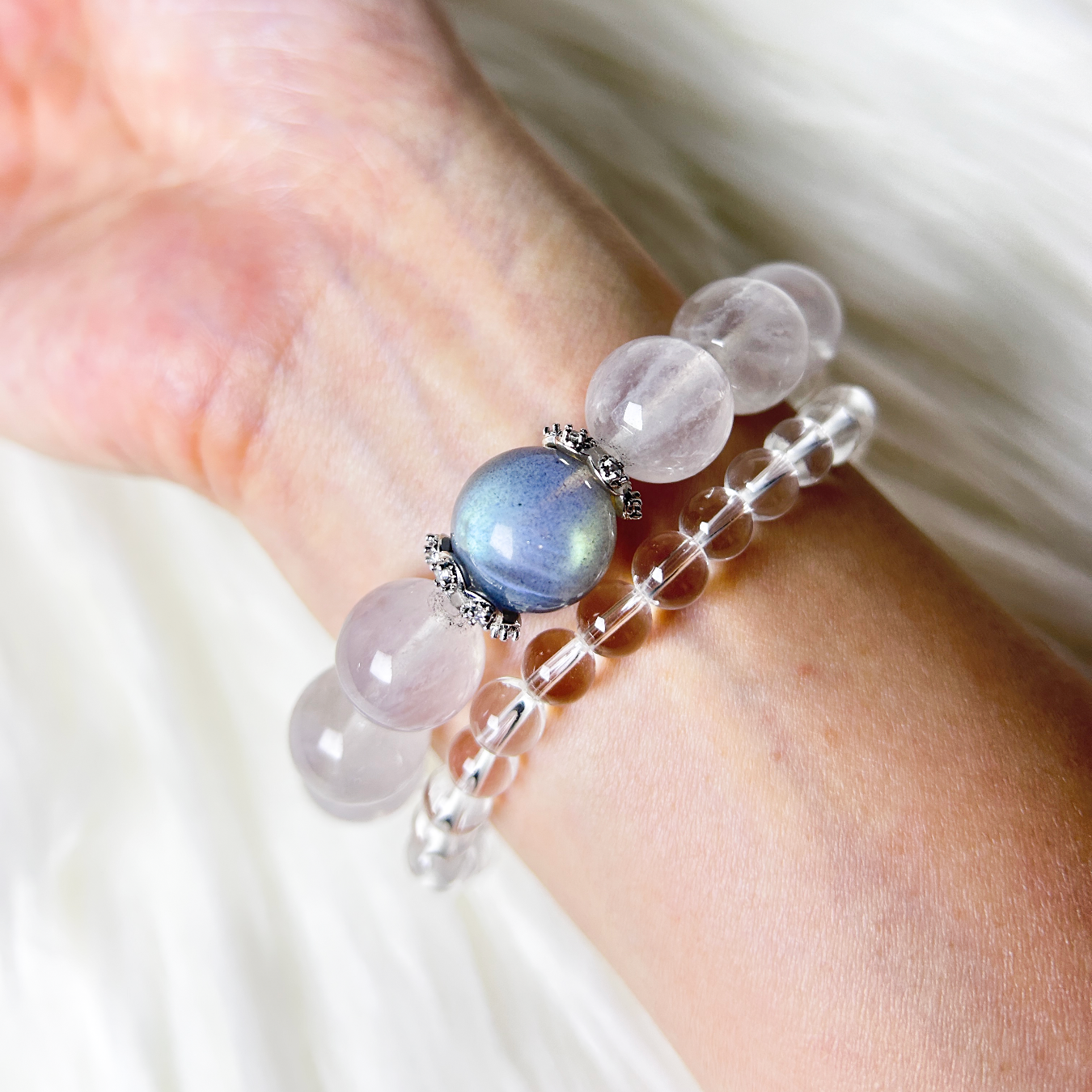 Wrist shot of labradorite centerpiece bracelet with Clear Quartz and White Rabbit Hair Rutilated Quartz