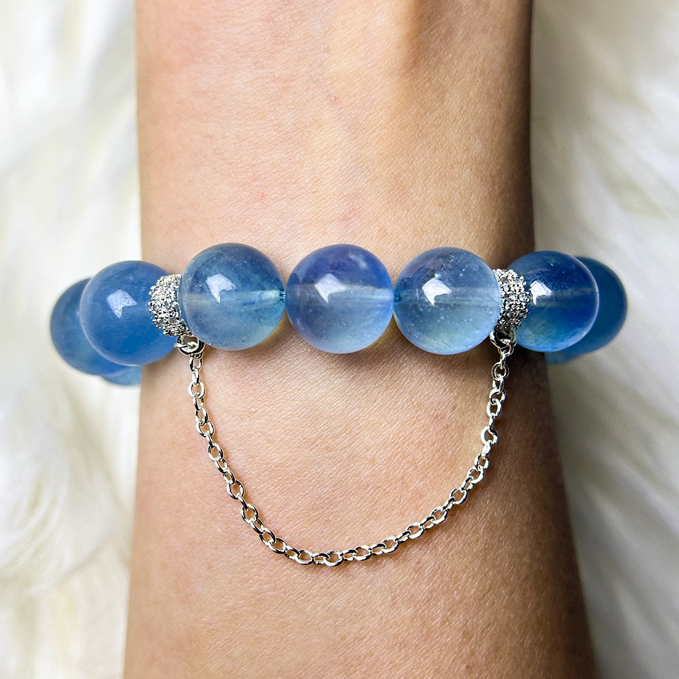 Aquamarine bracelet with silver chain charm and crystal spacers back view